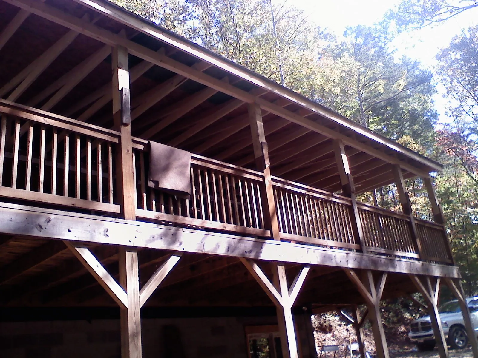 Timber framing under a new elevated porch and deck — Roof Leak Repair in Coleharbor by Roofing Brothers